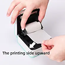 Step 4, place the end of the paper roll into the thermal printer head and close the cover, then you can use Phomemo M02 PRO to print your own sticker.