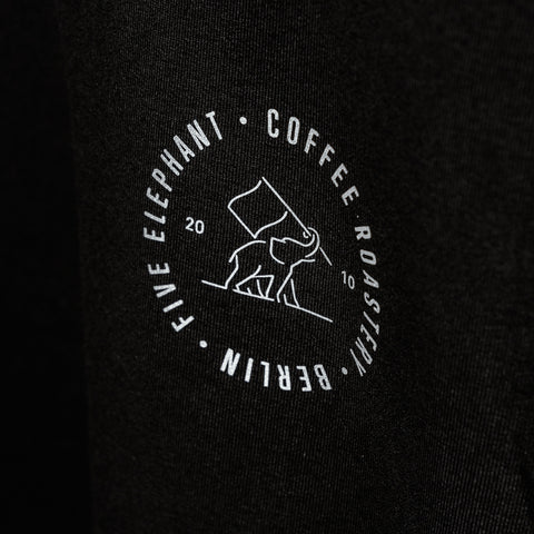 Five Elephant. Logo on the front of sweater.