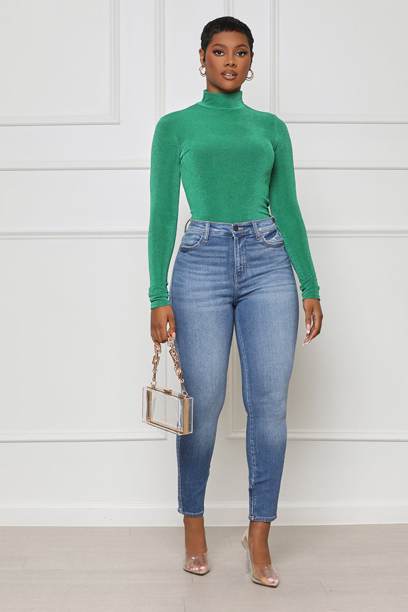 green bodysuit with jeans