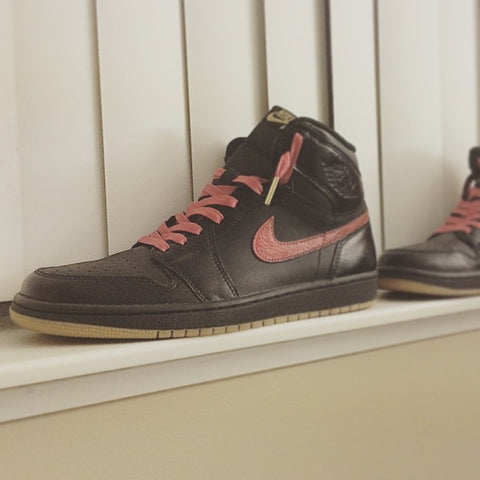 black jordan 1 with red laces