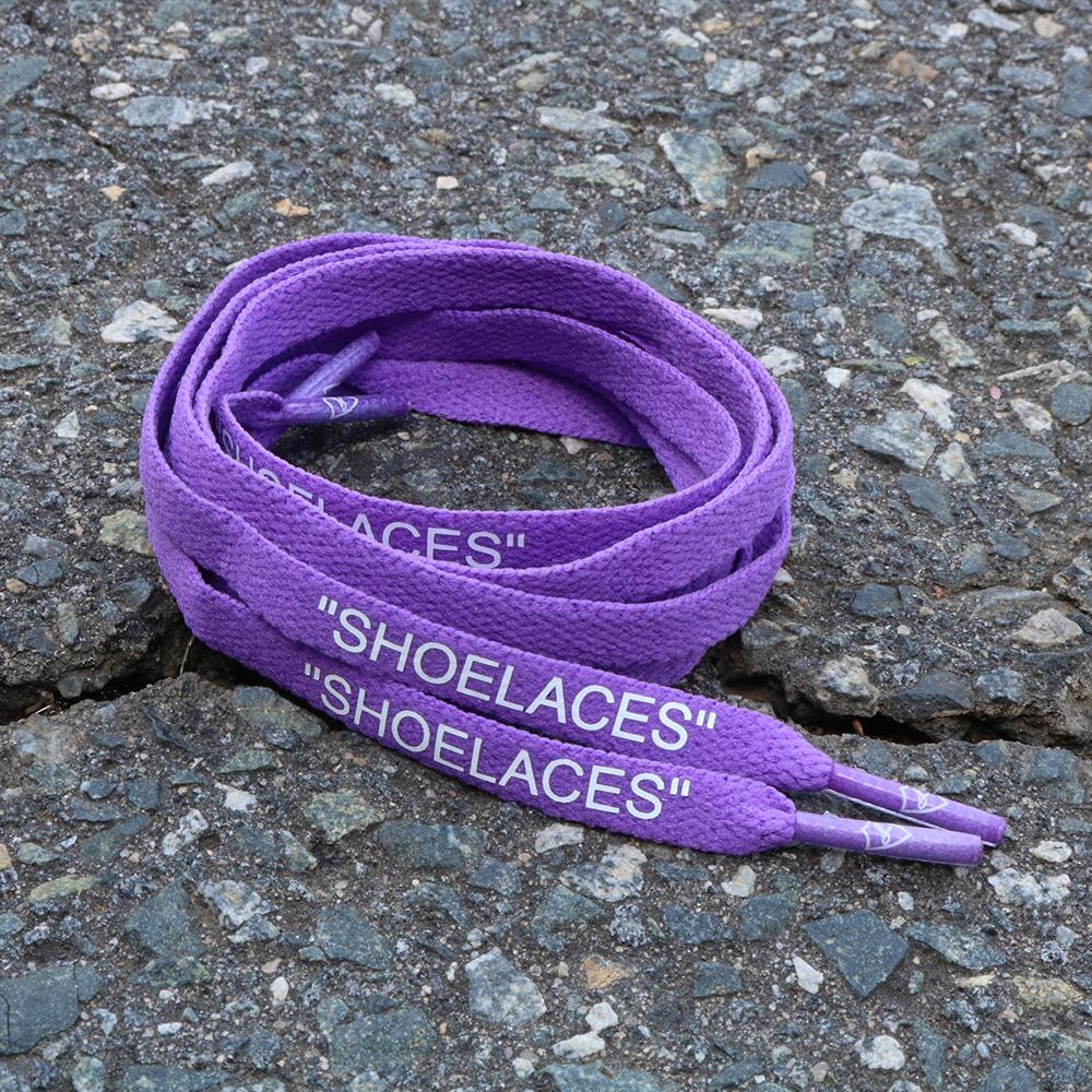 purple and yellow shoelaces