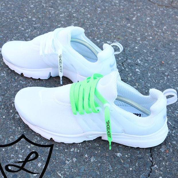 white sneakers with colored laces