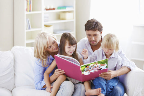 Family Gathering Around a My Social Book