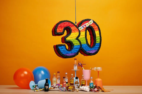 pinata shaped as the number thirty
