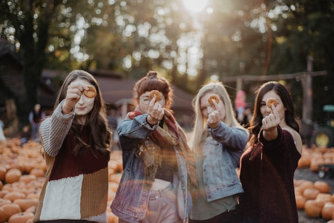 fall themed photo shoot of girls standing next to each other