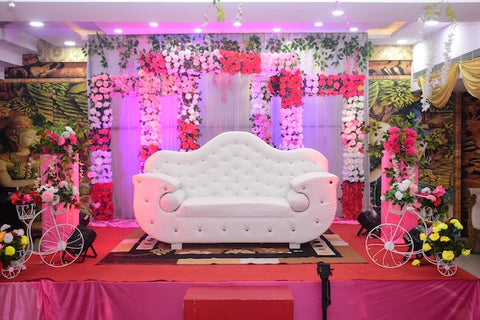white sofa on floral background