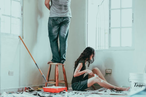 couple painting walls