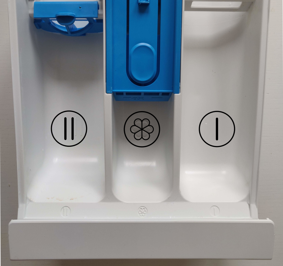 Washing machine drawer showing all compartments