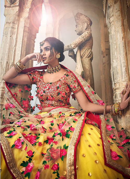 red and yellow bridal lehenga