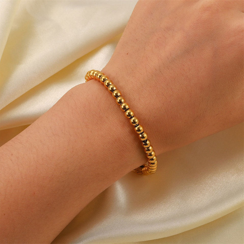 Se Golden Beads Armbånd 18K Guldbelagt 4mm hos Callisto Jewellery