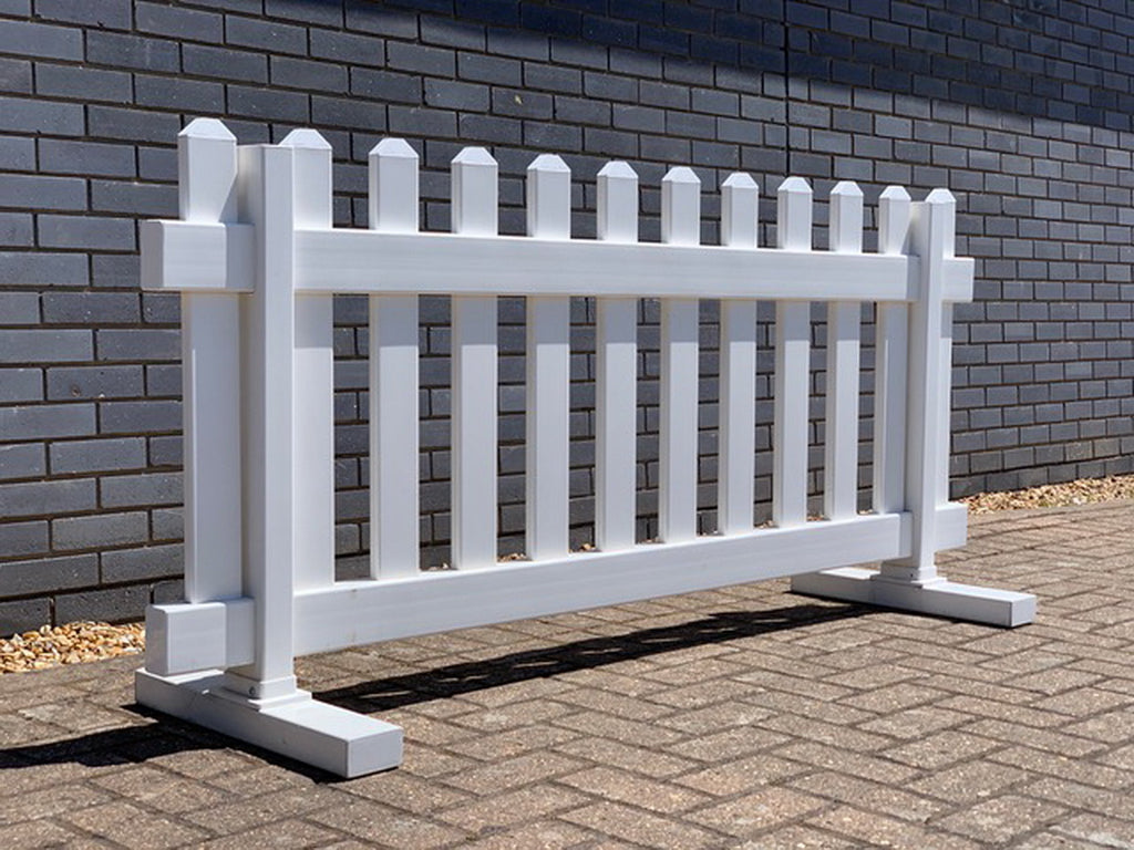 A photo showcasing a full-size picket portable temporary fence panel. The panel features a classic picket design, providing a charming and aesthetic look to any outdoor space. The fence panel is sturdy and versatile, suitable for various applications. It offers a temporary fencing solution that is easy to install and dismantle as needed.