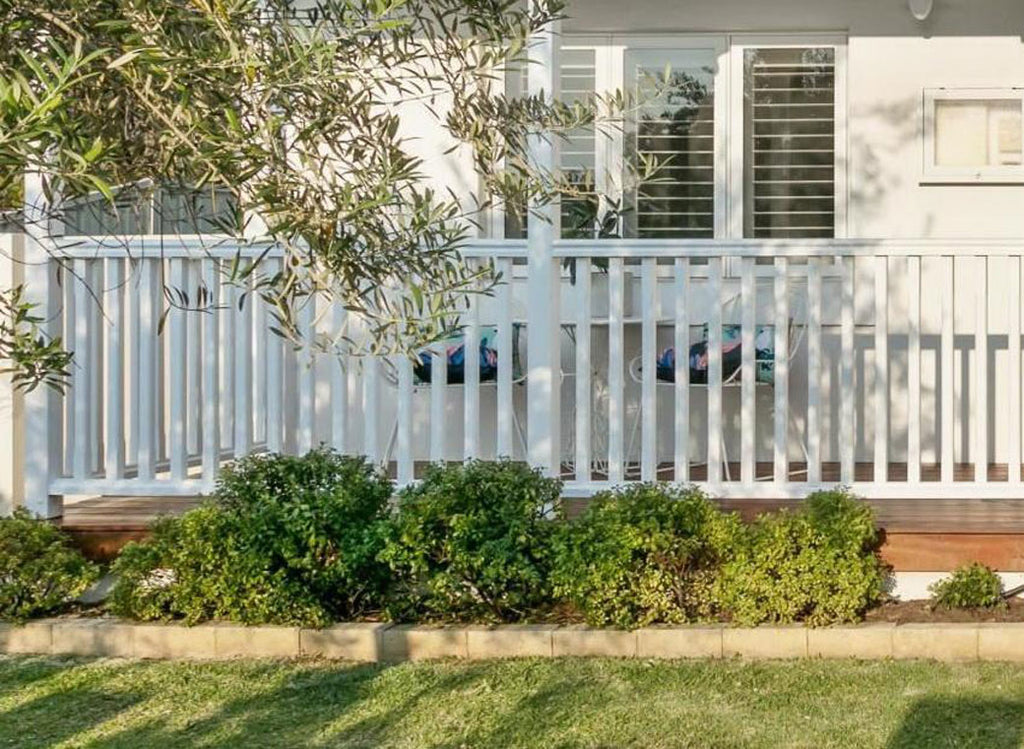 This photo displays a terrace pool fence installed on the terrace of a summer house, providing safety and security around the pool area. The fence's design blends seamlessly with the terrace, creating an inviting space for leisure and enjoyment.