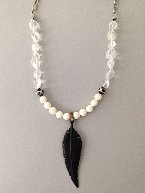 Black bone leaf pendant necklace