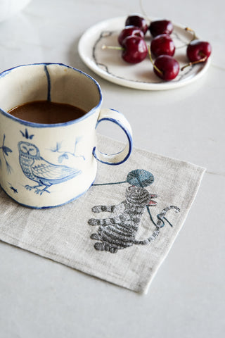 Playful cats embroidered cocktail napkin, mug and bowl of cherries