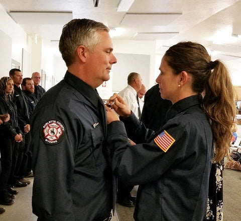 Stephanie and Chris completing firefighter training