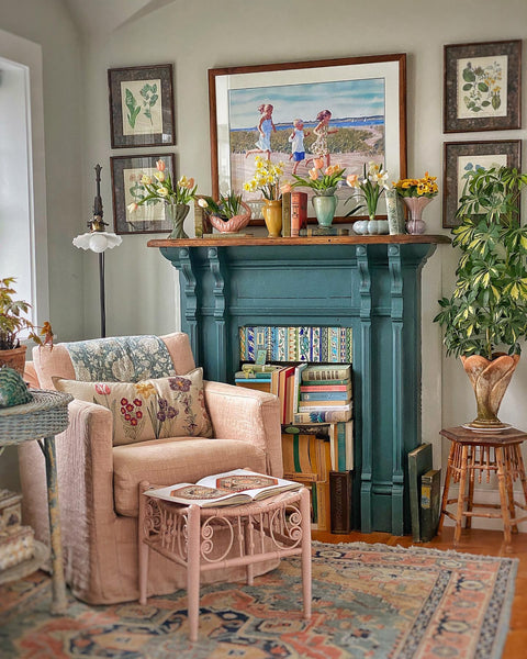 Molly in Maine living room with Coral & Tusk throw pillow Blooms