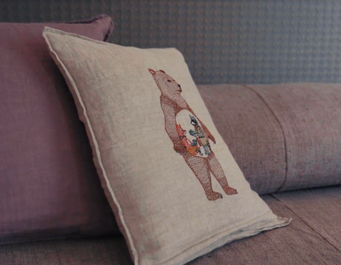 Coral & Tusk Bear embroidered pillow on Amanda Seyfried's bed