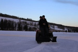 ATV with shovel for clearning snow