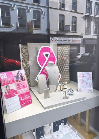 Jack Murphy Jewellers Window Display with Pink Jeweller and Cancer Focus Posters