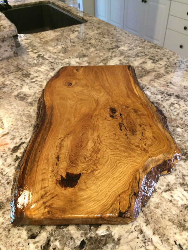a white oak wood finished charcuterie board