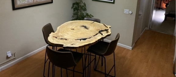 Circle live edge dining table with chairs