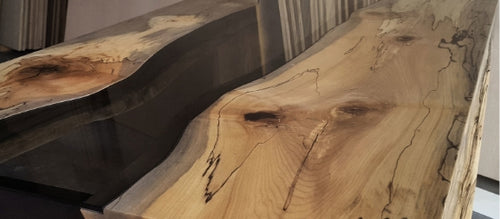 Close up of a live edge river table