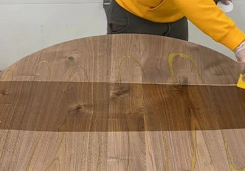 Oiling a live edge dining table slab