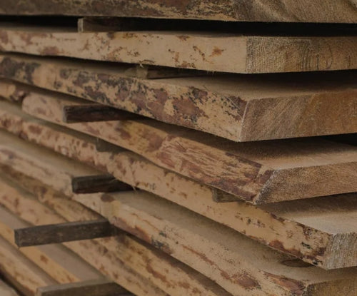 Close up photo of live edge wood slabs