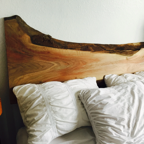 Headboard made from live edge wood