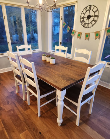 Walnut Wood Table with white chairs 