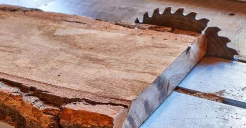 Cutting a wood slab with a table saw