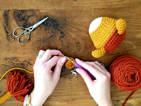 Hands doing crochet
