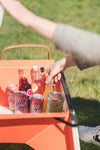 Close up of Oru Camp Switch table storage compartments to store beverages