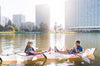 Couple on a white kayak in the middle of the lake