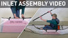A woman demonstrating how to assemble the kayak