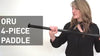 A woman describing a paddle