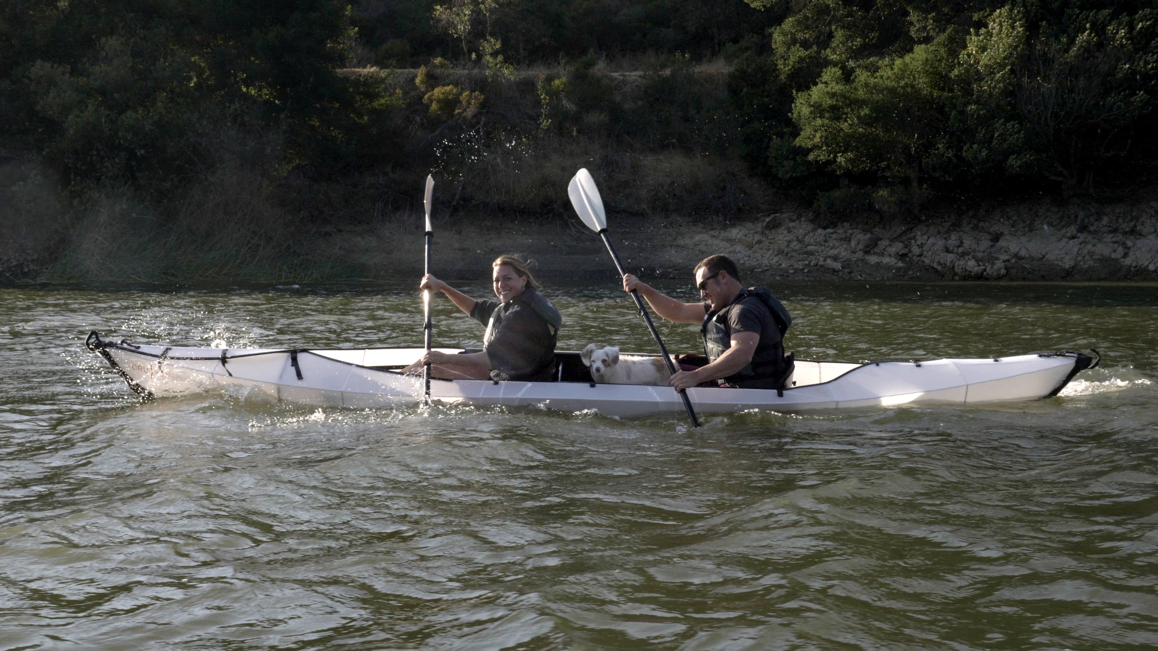 2 people and dog kayaking on a haven tt kayak