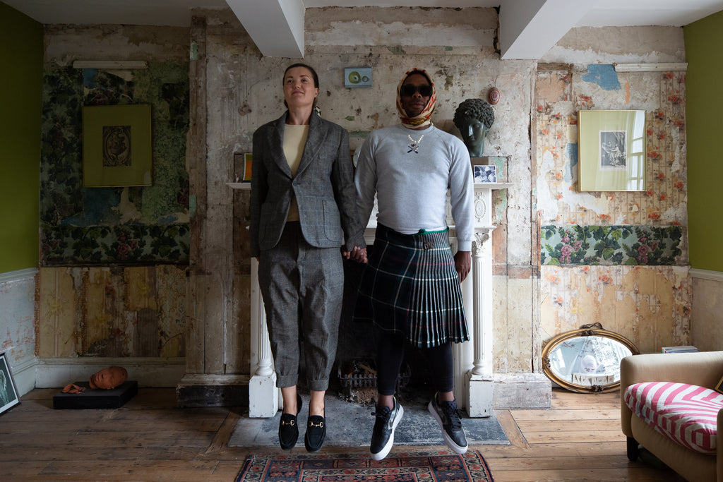 Portrait of designers Bayode & Claire in a traditional English interior