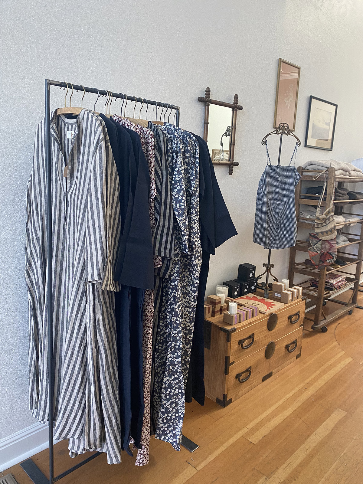 jess brown dresses and folded clothing in the jess brown shop