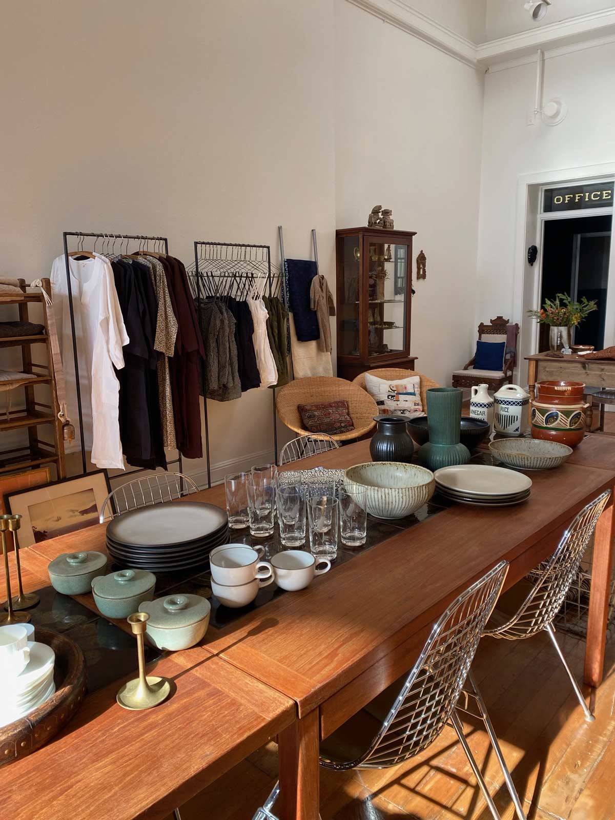 tableware and pottery on a wooden table in the jess brown shop