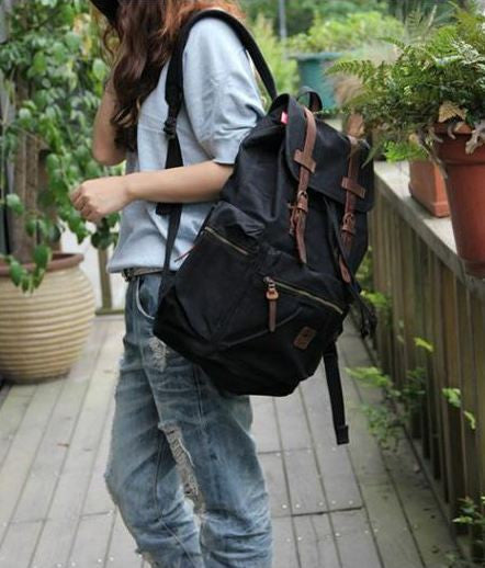 Casual Black Canvas Backpack with Adjustable Shoulder Straps for Work, School & Travel