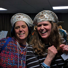 Again, the same two sisters trying on similiar hats - this time two Ivory and Brown Cheetah Spotted Berets. 