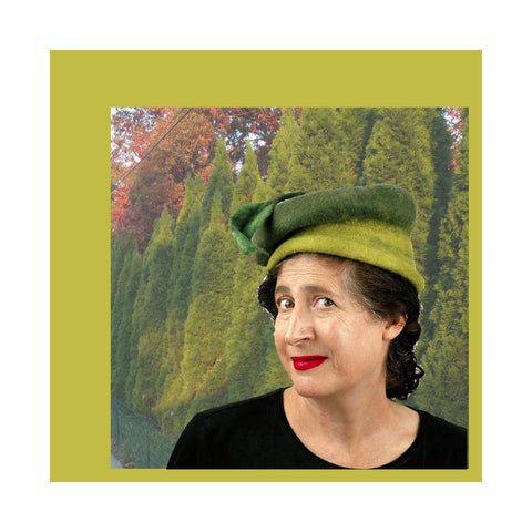 Leafy Green Hat against trees
