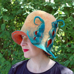 A summery colored Peapod hat in yellow, orange and green for Winterwear