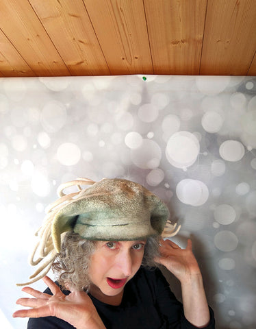 Larking about during recent photoshoot for FeltHappiness Hats