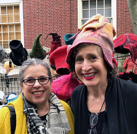 Here I am wearing a warm peach hat borrowed from my shop. On my right, wearing a yellow coat, is my former weaving teacher art RISD, Susan Sklarek.