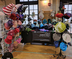 Booth of Felted Hats all ready to be tried on at the Indie Knit and Stitch at the Ace Hotel PGH