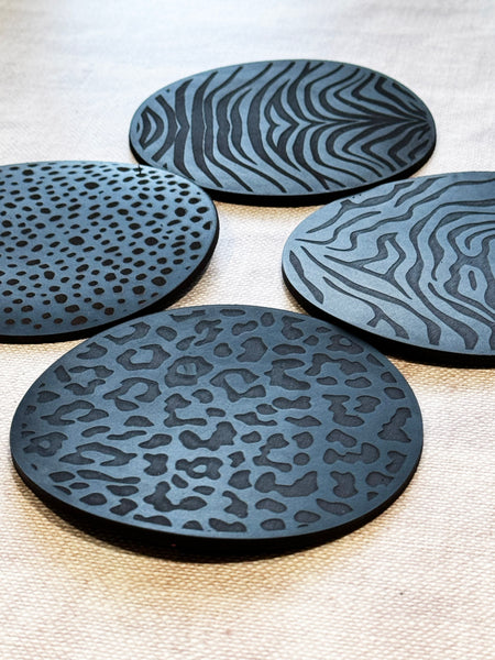 black animal print leather coasters, perfect for leather anniversary.