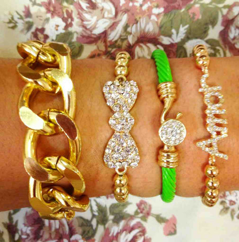 ARM CANDY – Materialistic Diva