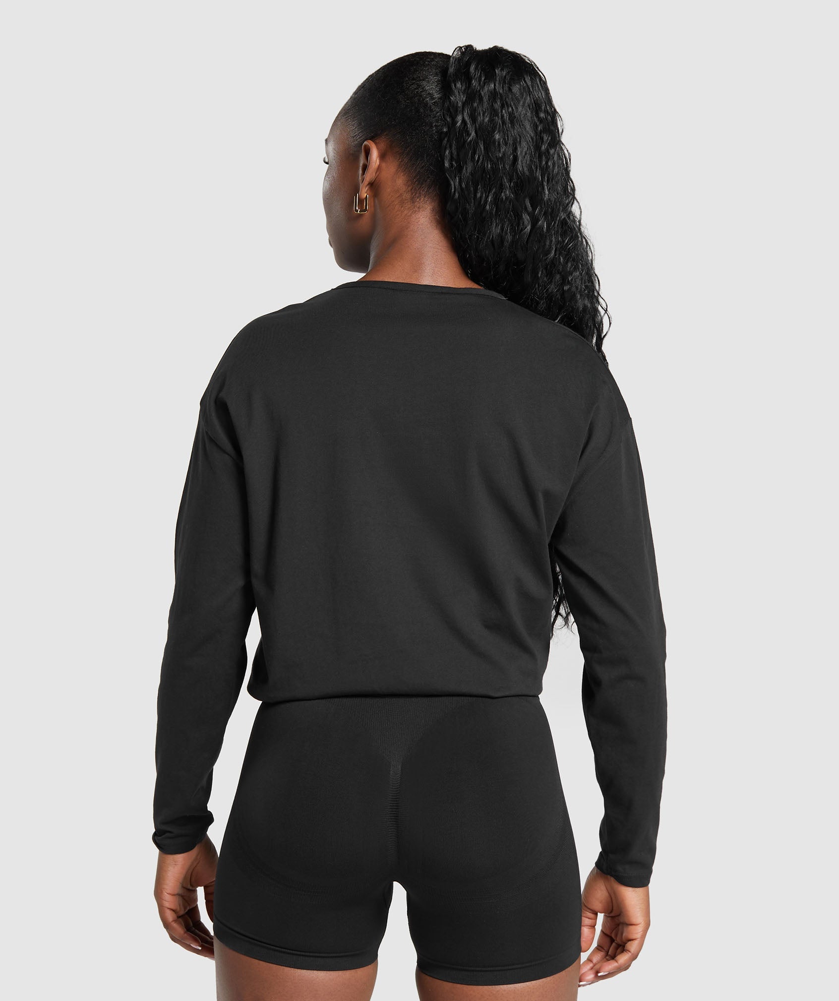 Training Oversized Cotton Long Sleeve Top in Black - view 2